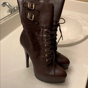 Women’s Bebe brown boots with buckles. Brand new